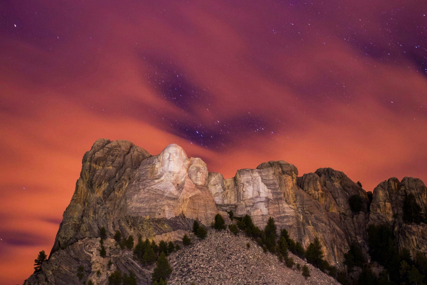 The Stars Peak Through The Clouds At Mount Rushmore